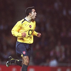 Robin van Persie celebrates scoring arsenals 2nd goal from the penalty spot