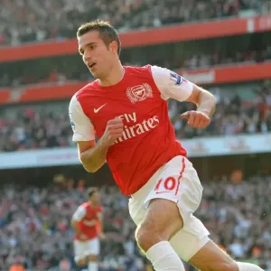 Robin van Persie celebrates scoring Arsenals 2nd goal his 1st. Arsenal 3: 1 Stoke City