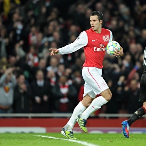 Robin van Persie celebrates scoring Arsenals 3rd goal. Arsenal 3: 0 AC Milan