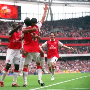 Robin van Persie celebrates scoring Arsenals 3rd goal his 2nd with Theo Walcott