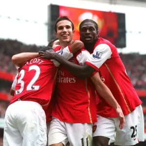 Robin van Persie celebrates scoring Arsenals 3rd goal his 2nd with Theo Walcott