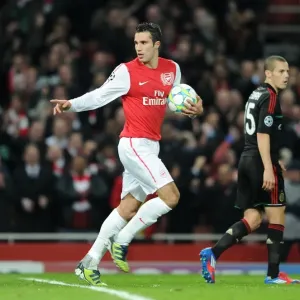 Robin van Persie celebrates scoring Arsenals 3rd goal. Arsenal 3: 0 AC Milan Robin van Persie celebrates scoring Arsenals 3rd goal. Arsenal 3: 0 AC Milan