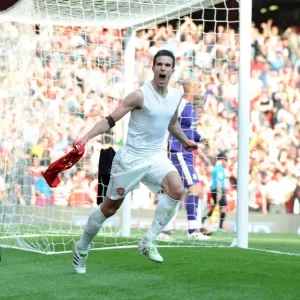 Robin van Persie celebrates scoring Arsenals goal. Arsenal 1: 1 Liverpool