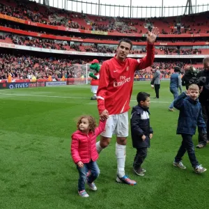 Robin van Persie Celebrates Victory: Arsenal v Norwich City, Premier League 2011-12 Robin van Persie Celebrates Victory: Arsenal v Norwich City, Premier League 2011-12