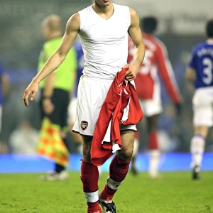 Robin van Persie goes to throw his shirt to the Arsenal