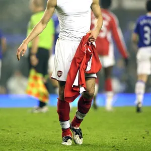 Robin van Persie goes to throw his shirt to the Arsenal