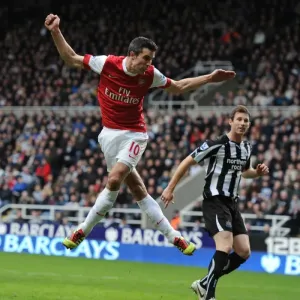 Print of Robin van Persie scoring for Arsenal at St James Park