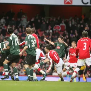 Robin van Persie heads past Roman Larrieu to score