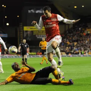 Robin van Persie Leaps Past Ronald Zubar: Wolverhampton Wanderers vs. Arsenal, Premier League, 2011-2012 Robin van Persie Leaps Past Ronald Zubar: Wolverhampton Wanderers vs. Arsenal, Premier League, 2011-2012