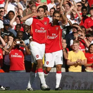Robin van Persie and Mathieu Flamini: Arsenal's Unstoppable Duo Celebrates 2-1 Over Inter Milan Robin van Persie and Mathieu Flamini: Arsenal's Unstoppable Duo Celebrates 2-1 Over Inter Milan
