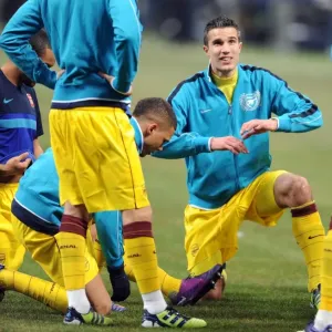 Robin van Persie Rallies Arsenal: United Front Against AC Milan in UEFA Champions League Showdown Robin van Persie Rallies Arsenal: United Front Against AC Milan in UEFA Champions League Showdown