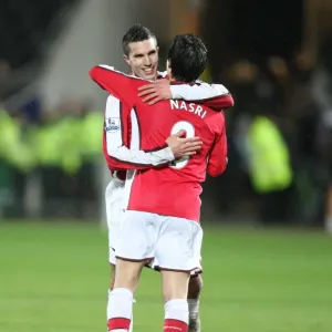 Robin van Persie and Samir Nasri celebrate the Arsenal