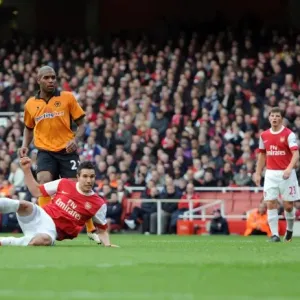 Robin van Persie scores his and Arsenals 1st goal under pressure from Richard Stearman