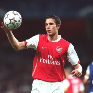 Robin van Persie Scores in Arsenal's 2-0 Victory over FC Porto in UEFA Champions League Group Stage at Emirates Stadium