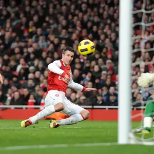 Robin van Persie scores his and Arsenals 2nd goal past Ali Al Habsi (Wigan) Robin van Persie scores his and Arsenals 2nd goal past Ali Al Habsi (Wigan)