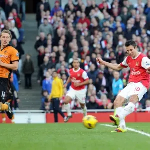 Robin van Persie scores his and Arsenals 2nd goal under pressure from Christophe Berra
