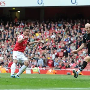 Robin van Persie scores Arsenals goal past James Collins (Villa). Arsenal 1 Robin van Persie scores Arsenals goal past James Collins (Villa). Arsenal 1