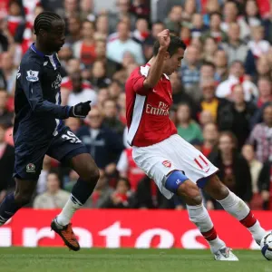 Robin van Persie shoots past Blackburn goalkeeper Paul
