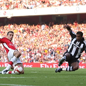 Robin van Persie shoots past Habib Beye to score the 2nd Arsenal goal