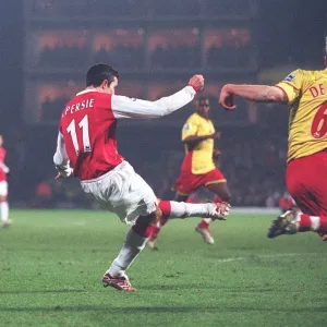 Robin van Persie shoots past Watford goalkeeper Ben Foster the score the 2nd Arsenal goal