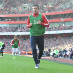 Robin van Persie Warming Up: Arsenal's 3-1 Victory Over Stoke City in the Premier League (2011)
