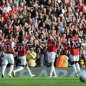 Robin van Persie's Brace: Arsenal Cruise Past Stoke City 3-1 in Premier League Action