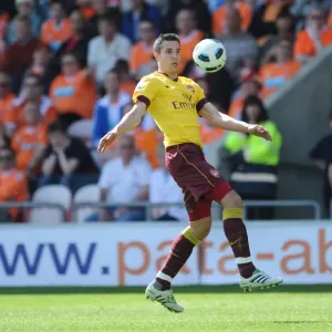 Robin van Persie's Brilliant Hat-Trick: Arsenal Crush Blackpool 3-1 in Premier League