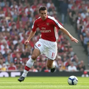 Robin van Persie's Brilliant Performance: Arsenal's 4-0 Victory Over Wigan Athletic in the Premier League Robin van Persie's Brilliant Performance: Arsenal's 4-0 Victory Over Wigan Athletic in the Premier League
