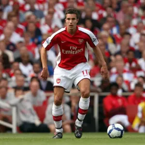 Robin van Persie's Brilliant Performance: Arsenal's 4-1 Premier League Victory over Portsmouth Robin van Persie's Brilliant Performance: Arsenal's 4-1 Premier League Victory over Portsmouth