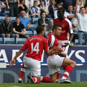 Robin van Persie's First Arsenal Goal: A Historic Moment with Theo Walcott and Emmanuel Eboue (4-0 vs. Blackburn Rovers, 2008) Robin van Persie's First Arsenal Goal: A Historic Moment with Theo Walcott and Emmanuel Eboue (4-0 vs. Blackburn Rovers, 2008)