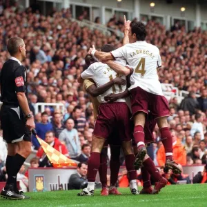 Robin van Persie's Game-Winning Goal: Arsenal's Victory Celebration with Eboue and Fabregas vs. West Ham, 2007 Robin van Persie's Game-Winning Goal: Arsenal's Victory Celebration with Eboue and Fabregas vs. West Ham, 2007