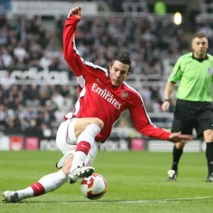 Robin van Persie's Hat-Trick: Arsenal's 3-1 Victory Over Newcastle United in the Premier League