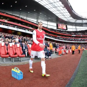 Robin van Persie's Hat-Trick: Arsenal's Dominant 3-0 Win Over Wigan Athletic in the Premier League Robin van Persie's Hat-Trick: Arsenal's Dominant 3-0 Win Over Wigan Athletic in the Premier League