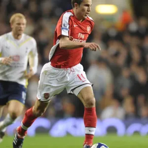 Robin van Persie's Strike: Arsenal's Thrilling 2-1 Victory Over Tottenham in the Premier League