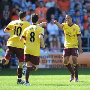 Robin van Persie's Stunner: Theo Walcott and Samir Nasri Celebrate Arsenal's 3-1 Win Over Blackpool