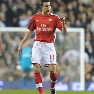 Robin van Persie's Thrilling Strike: Arsenal's 2-1 Victory Over Tottenham in the Premier League Rivalry