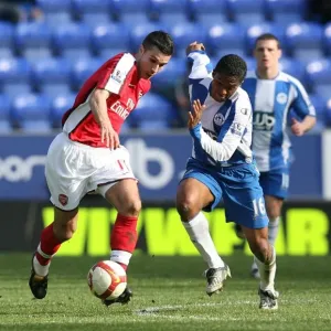 Robin van Persie's Unstoppable Performance: Arsenal's 4-1 Crush of Wigan Athletic (April 11, 2009) Robin van Persie's Unstoppable Performance: Arsenal's 4-1 Crush of Wigan Athletic (April 11, 2009)