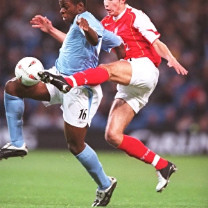 Rodin van Persie (Arsenal) Nedum Onuoha (Man City). Manchester City v Arsenal