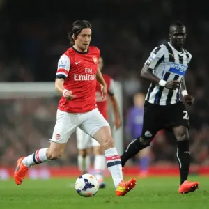 Rosicky Outpaces Tiote: Intense Moment from Arsenal vs. Newcastle United, Premier League 2013-2014 Rosicky Outpaces Tiote: Intense Moment from Arsenal vs. Newcastle United, Premier League 2013-2014