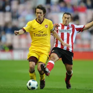 Rosicky vs Malbranque: A Battle at Stadium of Light in the 1:1 Arsenal-Sunderland Barclays Premier League Clash, September 18, 2010 Rosicky vs Malbranque: A Battle at Stadium of Light in the 1:1 Arsenal-Sunderland Barclays Premier League Clash, September 18, 2010