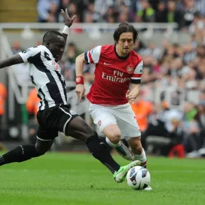 Rosicky vs. Tiote: A Battle for Ball Possession - Newcastle United vs. Arsenal (2013) Rosicky vs. Tiote: A Battle for Ball Possession - Newcastle United vs. Arsenal (2013)