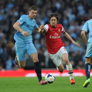 Rosicky's Magic: Outsmarting Dzeko and Navas in the Thrilling 2013/14 Arsenal vs. Manchester City Showdown