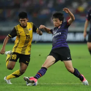 Ryo Miyaichi vs Ahmad Shakir Md Ali: Clash in the 2012-13 Malaysia XI vs Arsenal Match