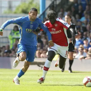 Sagna's Double Domination: Arsenal's 4-0 Triumph Over Portsmouth, 2009