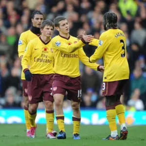 Sagna's Stunner: Arshavin, Chamakh, and Wilshere Celebrate Arsenal's Winning Goal vs. Everton, 2010