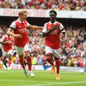 Saka and Odegaard: Arsenal's Dynamic Duo Celebrate First Goal at Emirates Cup 2022 Saka and Odegaard: Arsenal's Dynamic Duo Celebrate First Goal at Emirates Cup 2022