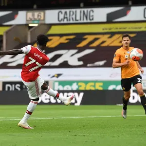 Saka Scores: Arsenal Triumph Over Wolverhampton Wanderers in Premier League Clash (2019-20)