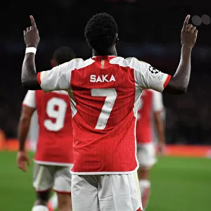 Saka Scores First Champions League Goal: Arsenal Secures Victory Over PSV Eindhoven (2023-24)