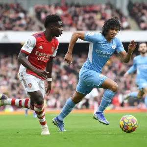 Saka Scores Spectacular Goal: Arsenal's Star Outwits Manchester City's Ake in Epic Premier League Clash