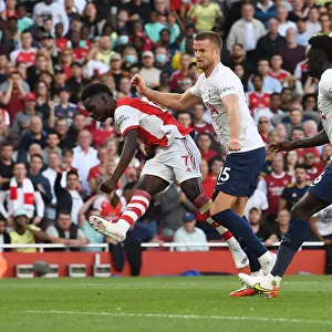 Saka Scores the Third: Arsenal's Victory over Tottenham in the 2021-22 Premier League